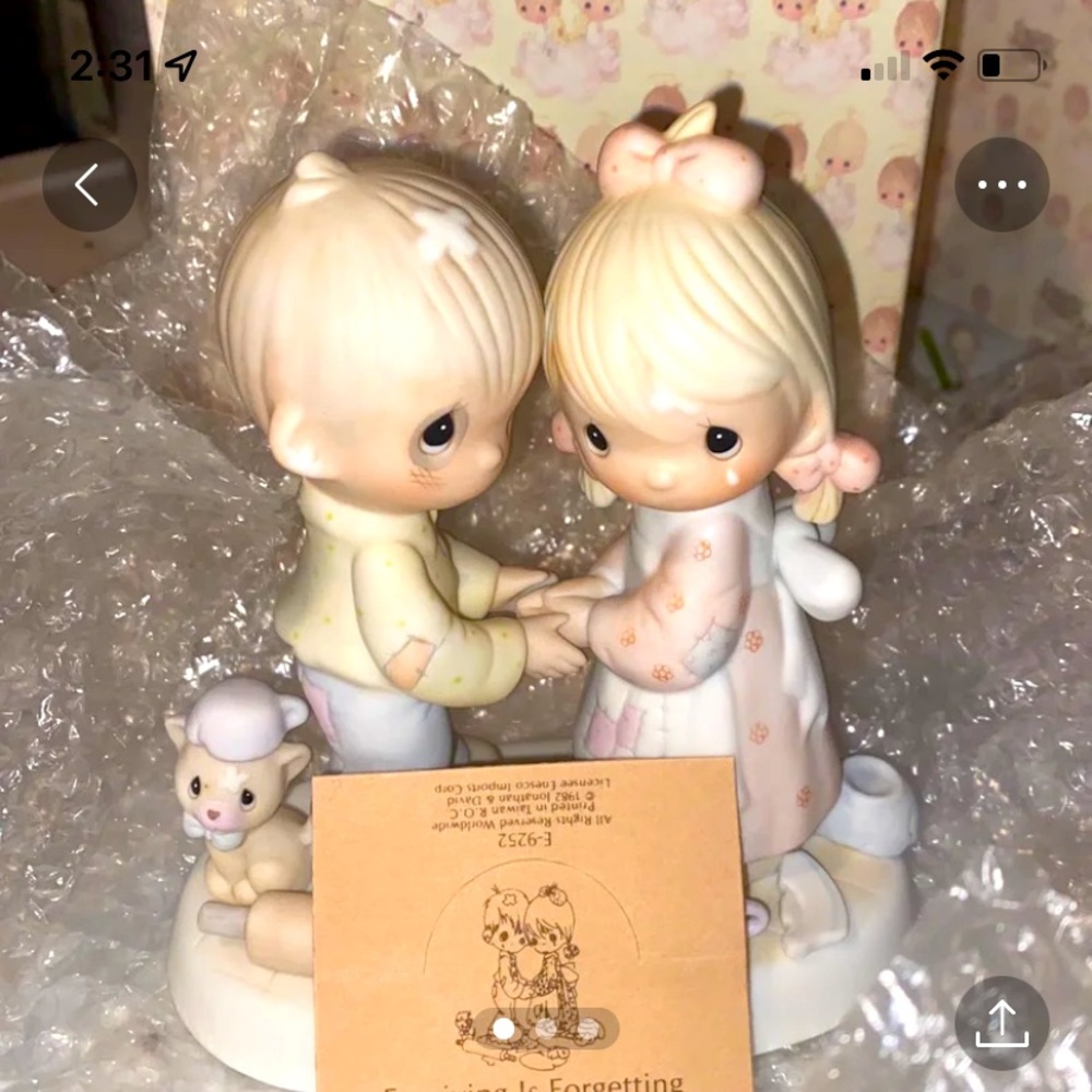 Precious Moments Figurine , “Forgiving is Forgetting “ .